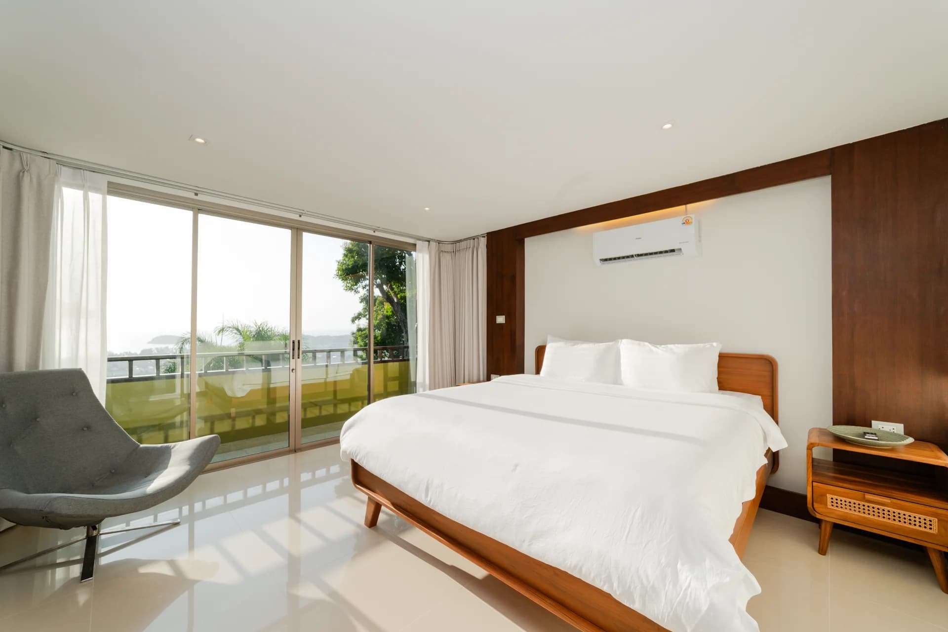 A sunlit bedroom at Villa 18